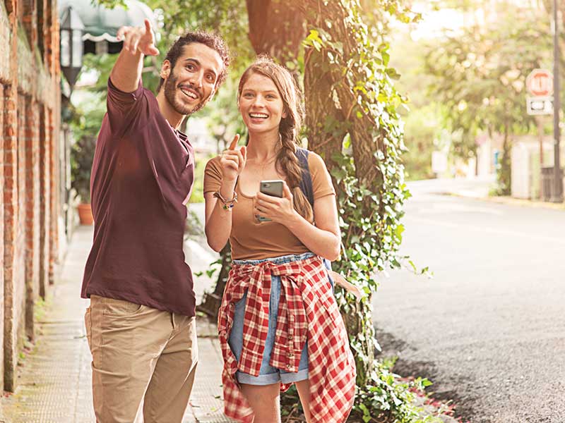 A man and a woman taking a picture together.
