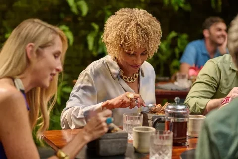 Diners enjoying dinner at Silvestre Restaurant in San José, Costa Rica
