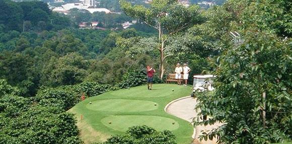 golf hole at mountain cliff