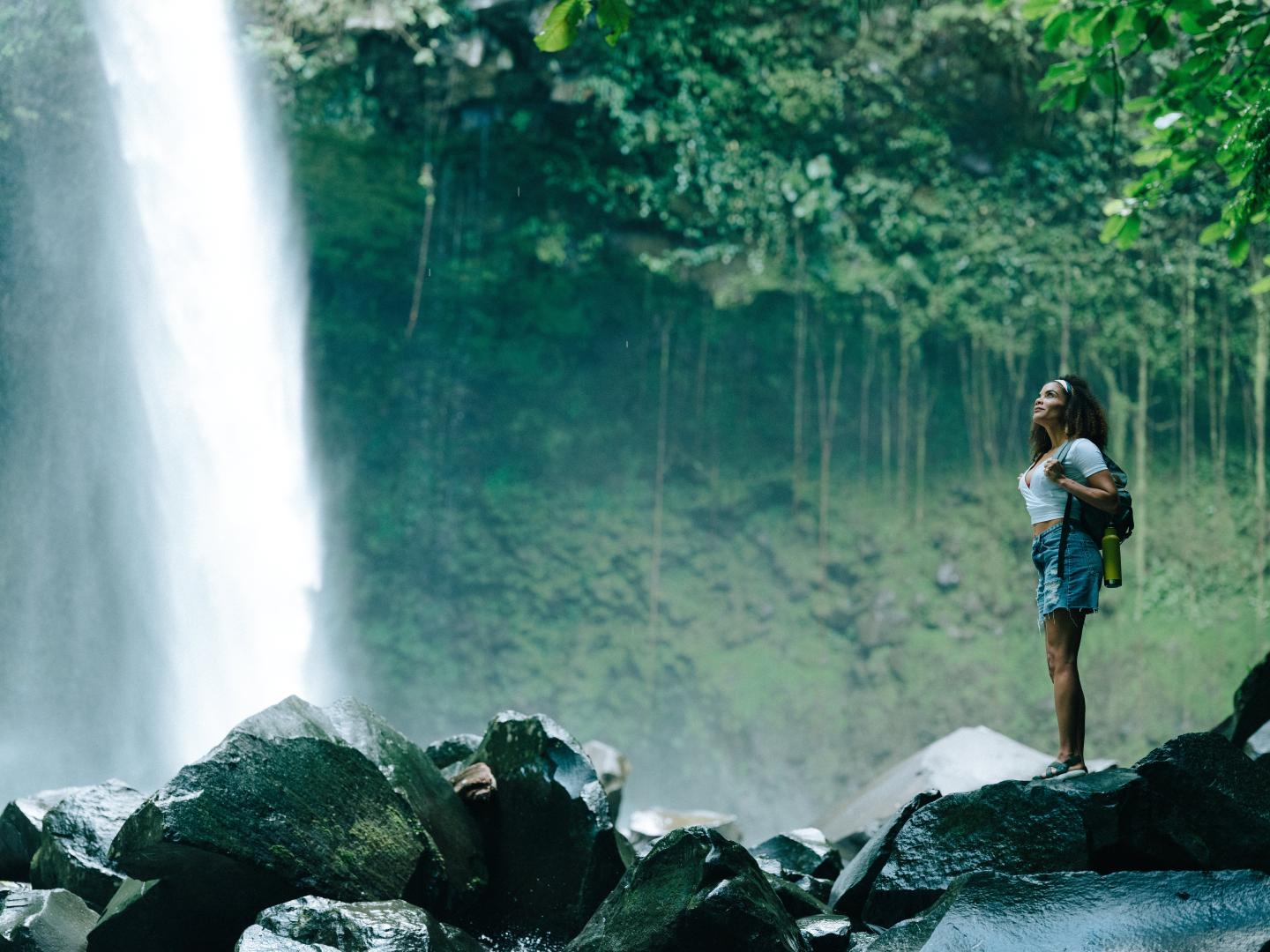 woman by waterfall