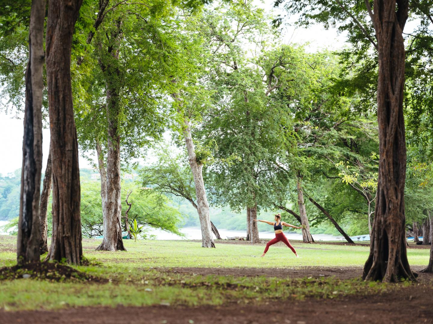 Woman doing yoga in park